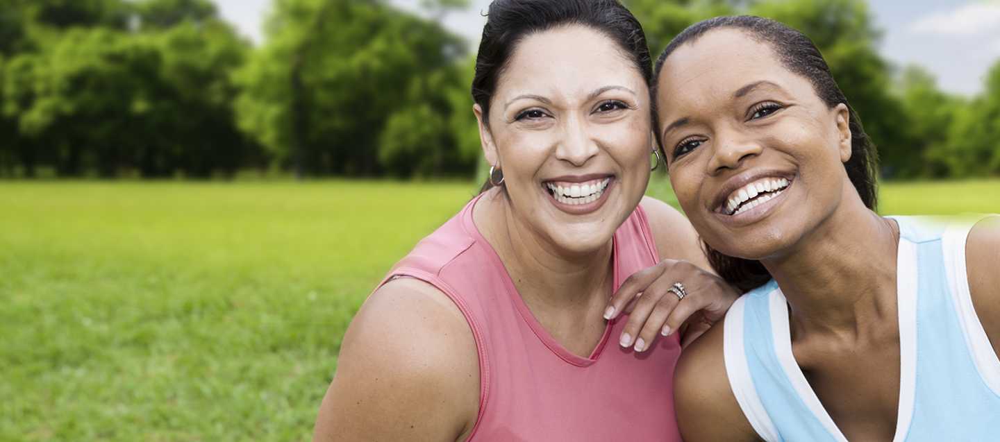 Two women smiling